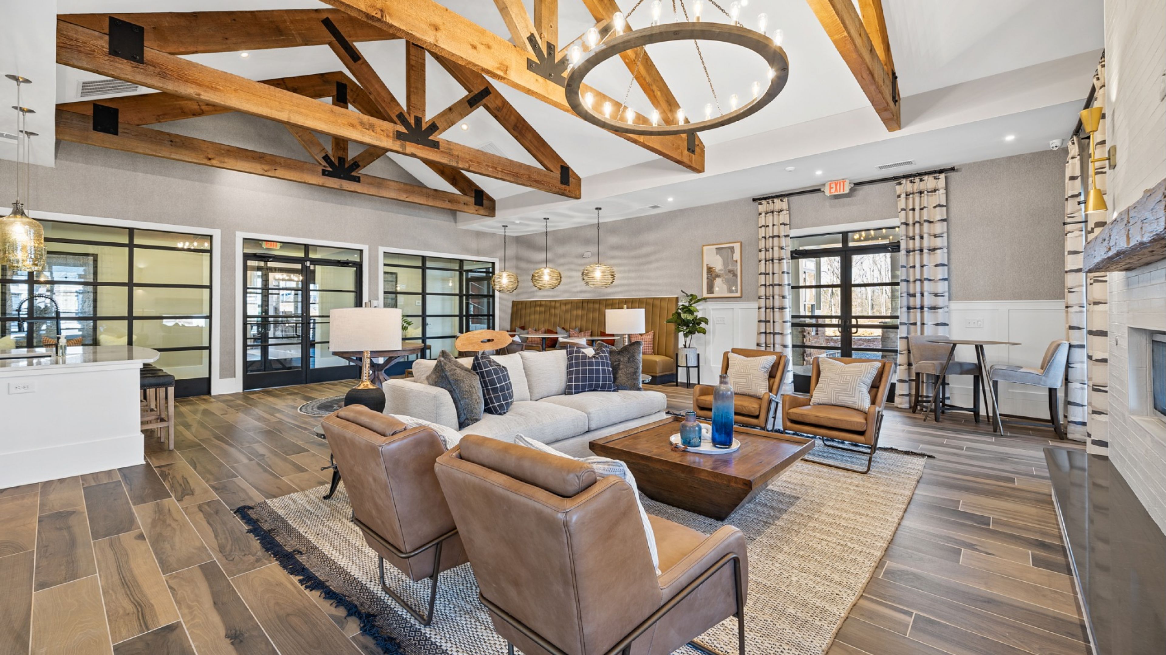 Hawthorne Waterstone gorgeous resident clubhouse with seating and a fireplace